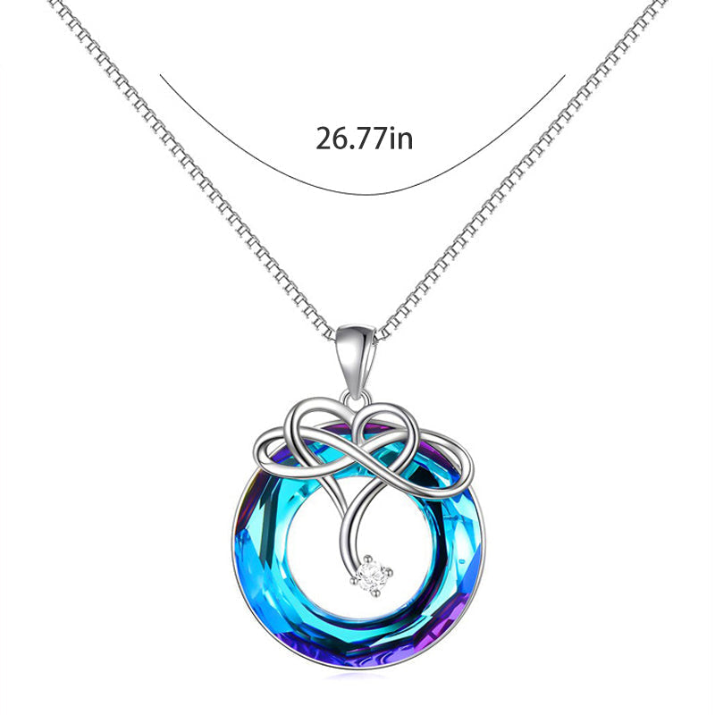 "Kvinna oändlighet halsband & örhängen set i silver och blått, elegant smyckesdesign för modern stil och tidlös charm."