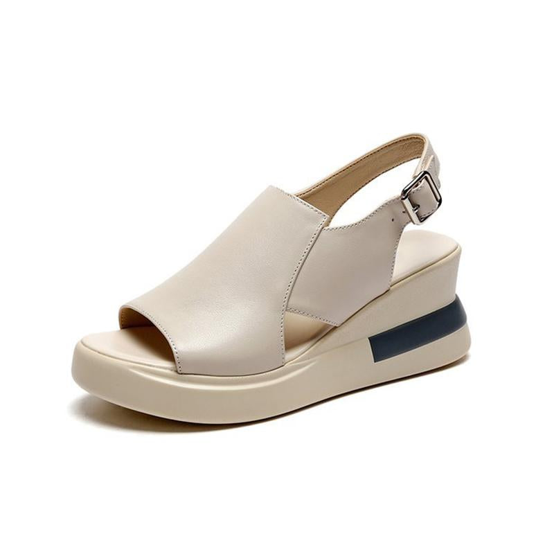 "Kvinners mjuka lädersandaler i svart och beige med 6,5 cm klack, smala remmar och ventilerande design för sommarkomfort."