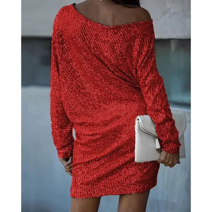 Off-shoulder paljett miniklänning, idealisk som festklänning eller elegant cocktailklänning.