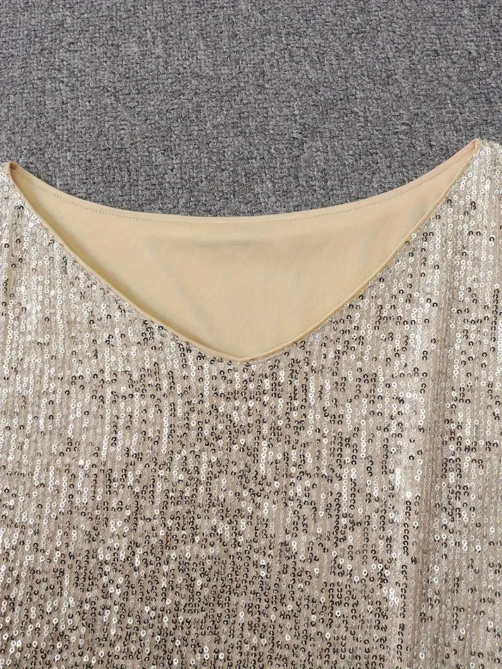 Trendig kvinnors off-shoulder klänning med paljetter, en perfekt miniklänning för festligheter.
