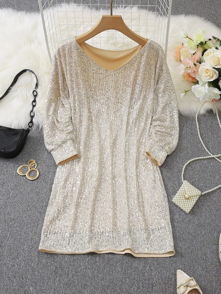 Glamorös off-shoulder paljettklänning, en kort kvinnoklänning idealisk för nattliga evenemang.
