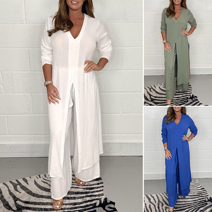 "Kvinnlig tvådelad kostym med lång topp, elastiska midjebyxor i vit och blå, elegant och bekväm design för alla tillfällen."
