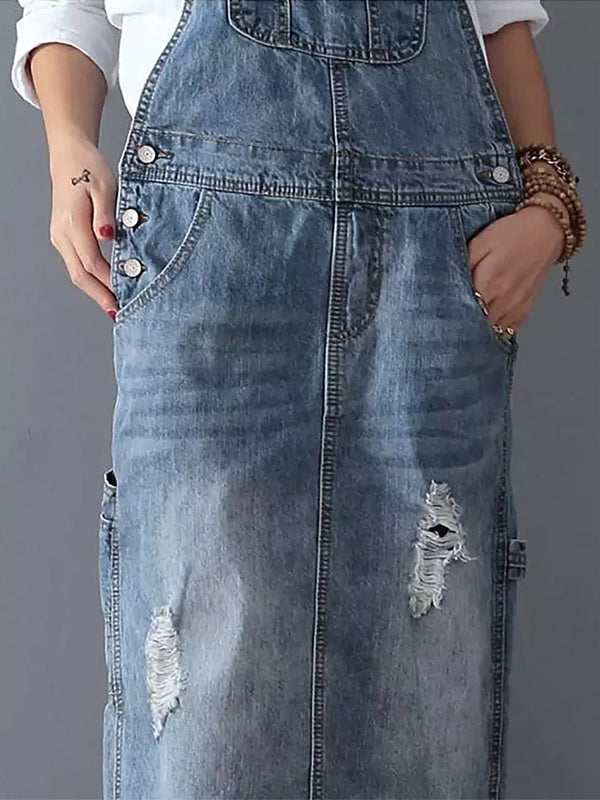 Kvinnors sommarklänning i bomullsdenim, blå färg, med avslappnad passform och tunna axelband.
