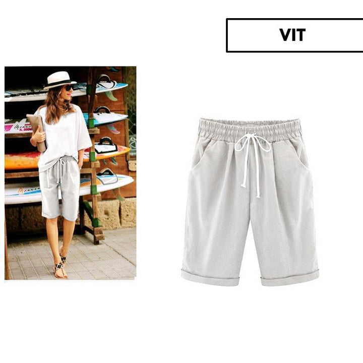 "Kvinnors avslappnade sommarshorts i polyester, löst sittande, olika färger, perfekt för vår och sommar."