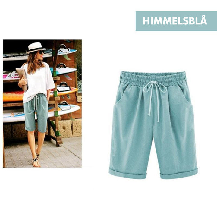 "Kvinnors avslappnade sommarshorts i polyester, löst sittande, olika färger, perfekt för vår och sommar."