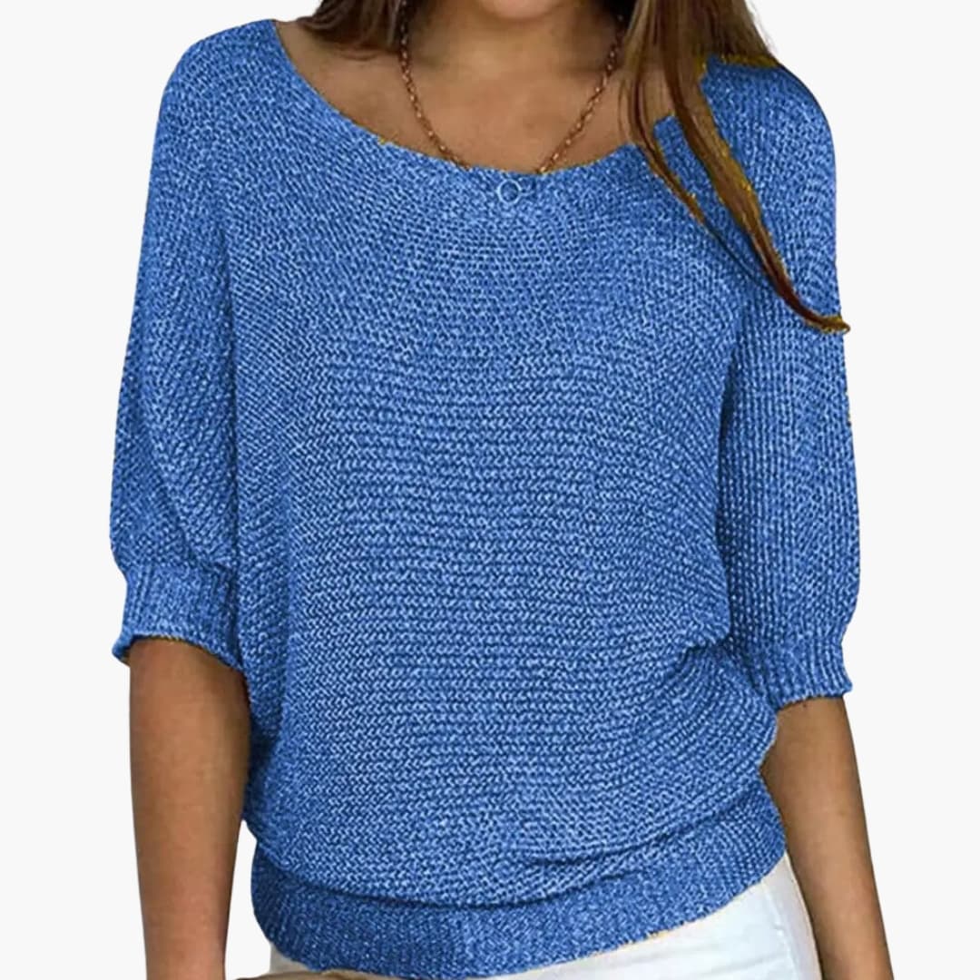 Damtröja med rund hals, trekvartsärmar och avslappnad passform. Modern stickad pullover, ett mångsidigt vardagsplagg.