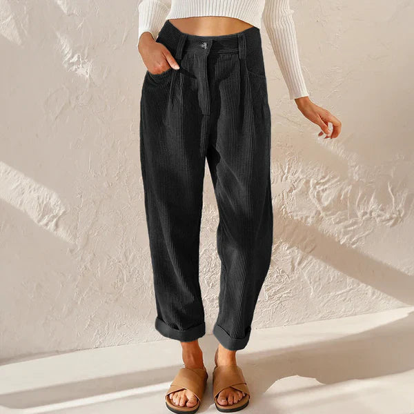 Kvinnors byxor för en avslappnad stil, med elastiskt midjeband och lös passform. Mångsidiga dammode.