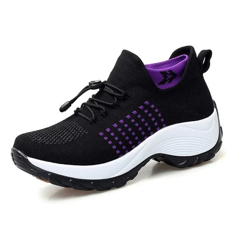 Bekväma rosa dam sneakers med stödjande sula, designade för långa aktiva dagar.