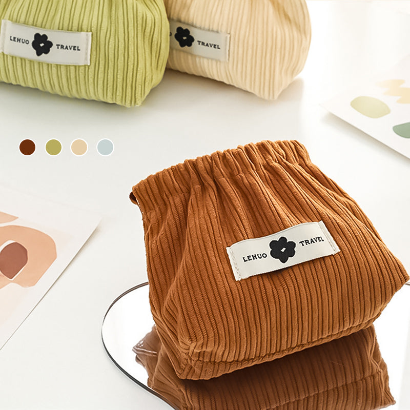 "Kvinnors corduroy hårsnodd organisatör, mjuk material, multifunktionell design, stilren blå nyans, kompakt storlek."