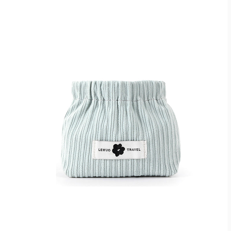 "Kvinnors corduroy hårsnodd organisatör, mjuk material, multifunktionell design, stilren blå nyans, kompakt storlek."