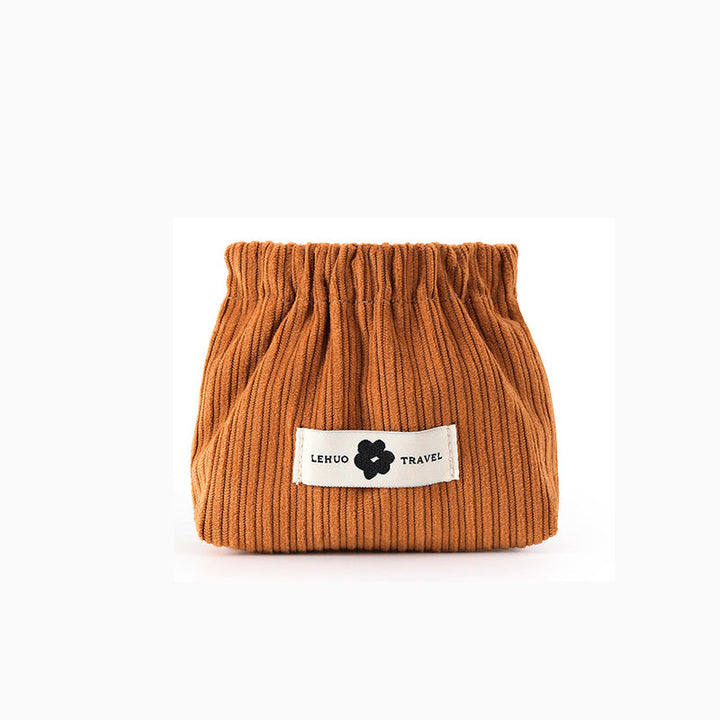 "Kvinnors corduroy hårsnodd organisatör, mjuk material, multifunktionell design, stilren blå nyans, kompakt storlek."
