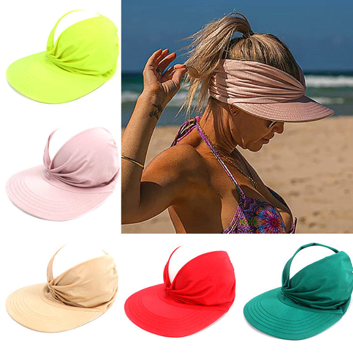 "Kvinnors elegant solhatt med brett brätte, justerbar passform, perfekt för solskydd på stranden eller i parken."