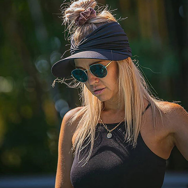 "Kvinnors elegant solhatt med brett brätte, justerbar passform, perfekt för solskydd på stranden eller i parken."