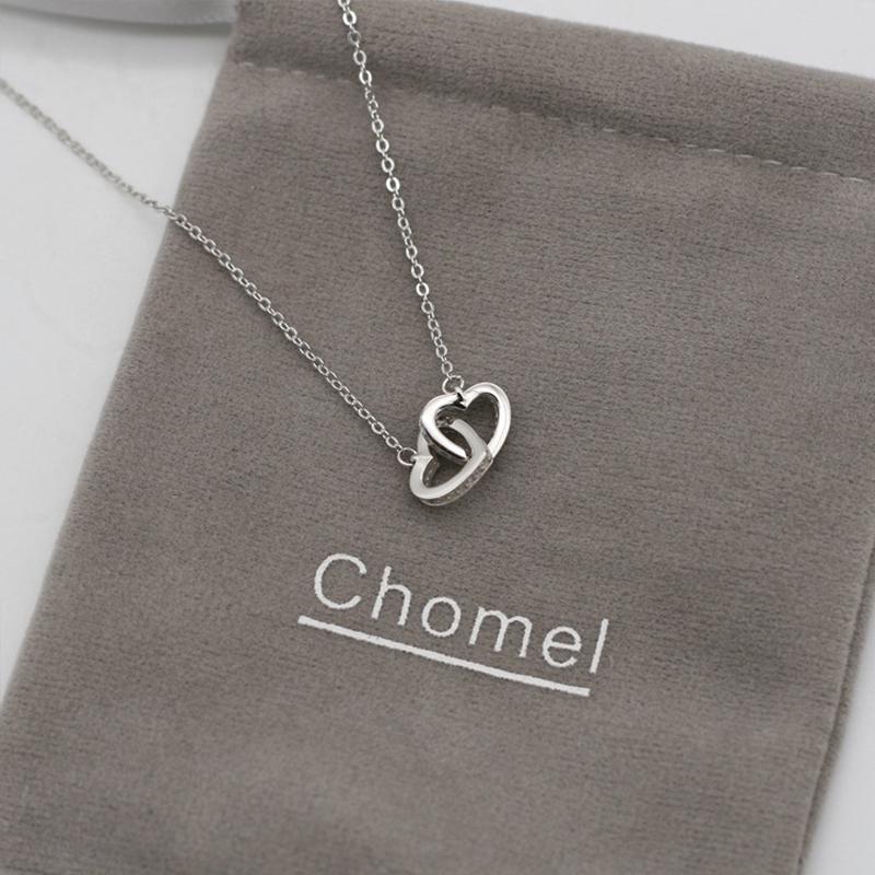 "Kvinnors halsband med rosguld/silver hjärthänge, zirconia-stenar, justerbar kedja; evig kärlek symboliserad."