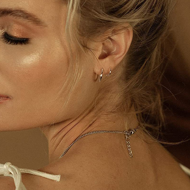 "Kvinnors kopparörhängen i spiralform med 14k guldplätering, elegant design för alla tillfällen."