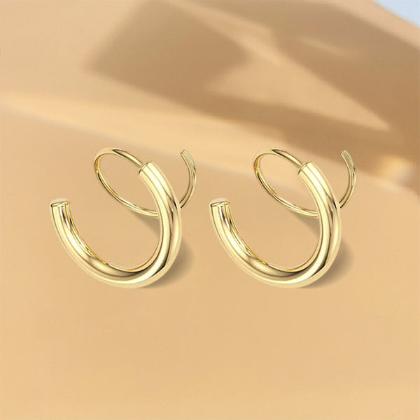 "Kvinnors kopparörhängen i spiralform med 14k guldplätering, elegant design för alla tillfällen."