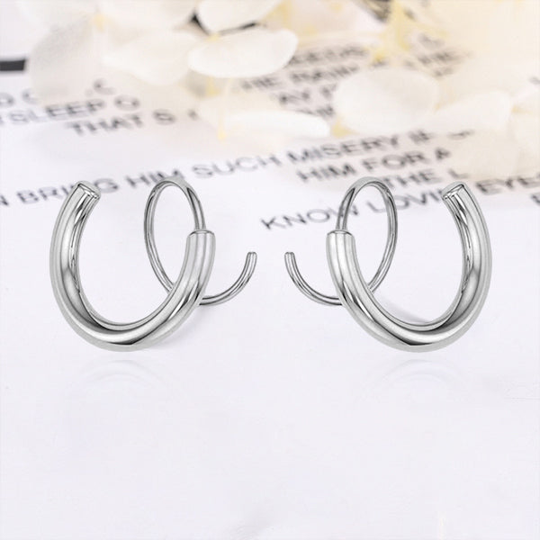 "Kvinnors kopparörhängen i spiralform med 14k guldplätering, elegant design för alla tillfällen."