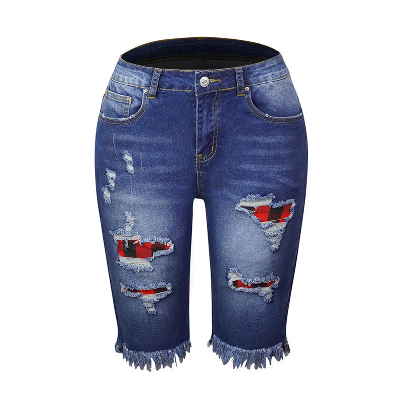 "Kvinnors ljusblå stretchiga jeans med leopardmönster, stilrena och bekväma för alla tillfällen."