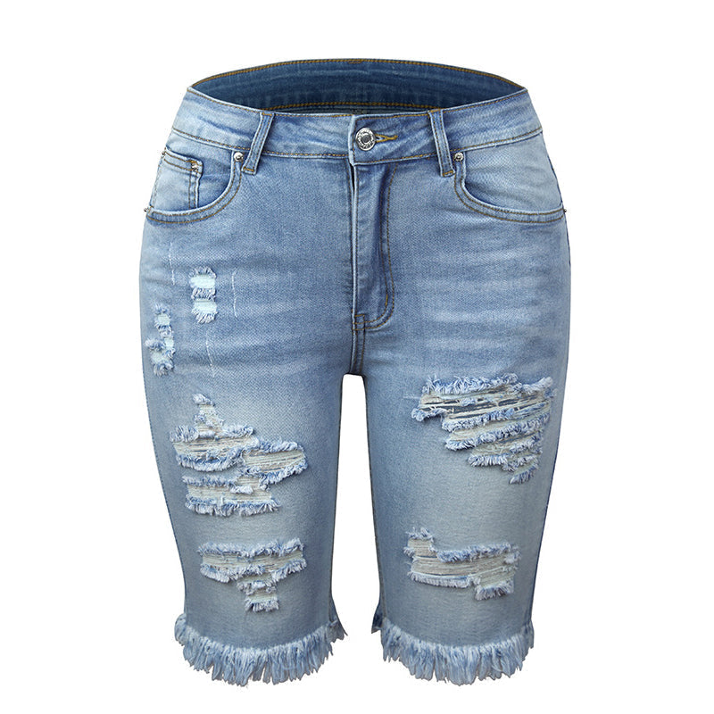 "Kvinnors ljusblå stretchiga jeans med leopardmönster, stilrena och bekväma för alla tillfällen."