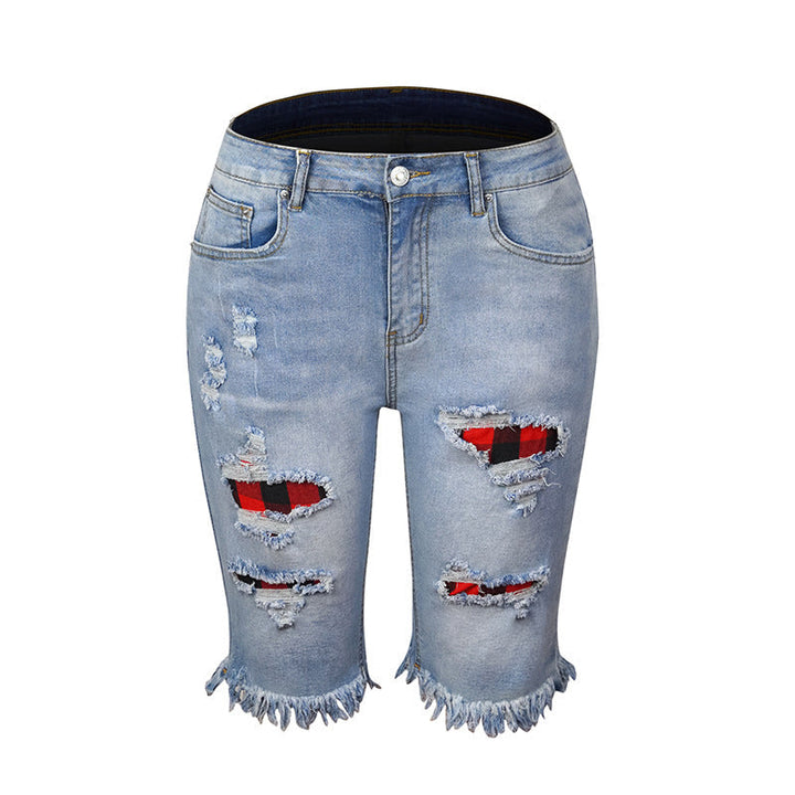 "Kvinnors ljusblå stretchiga jeans med leopardmönster, stilrena och bekväma för alla tillfällen."