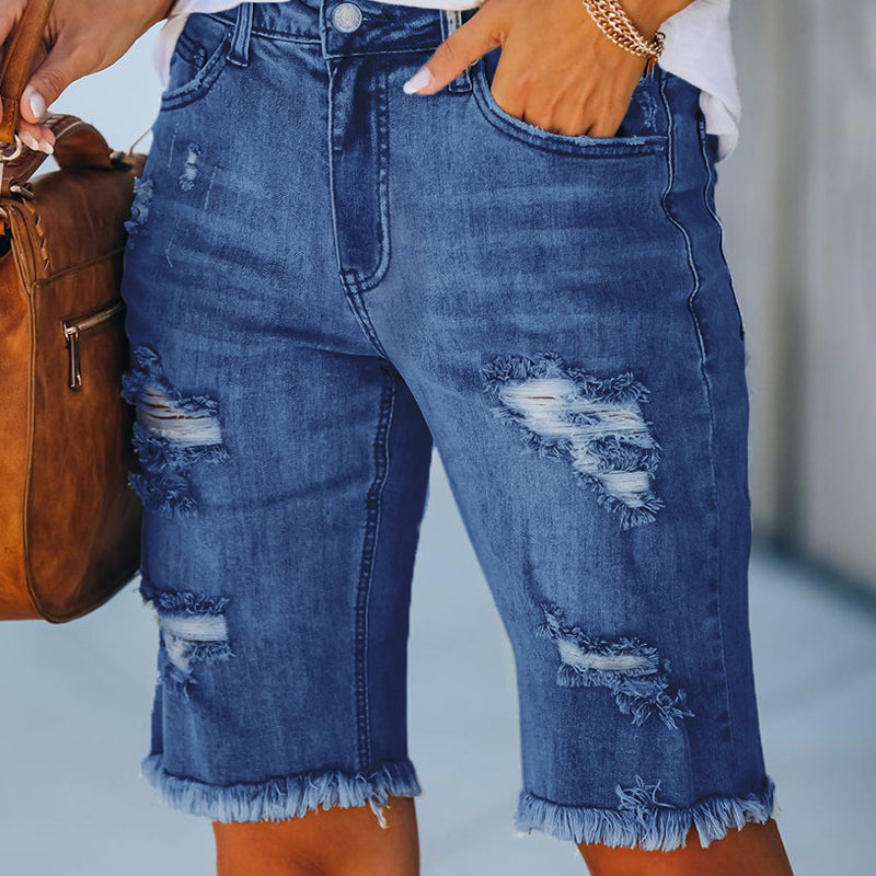 "Kvinnors ljusblå stretchiga jeans med leopardmönster, stilrena och bekväma för alla tillfällen."