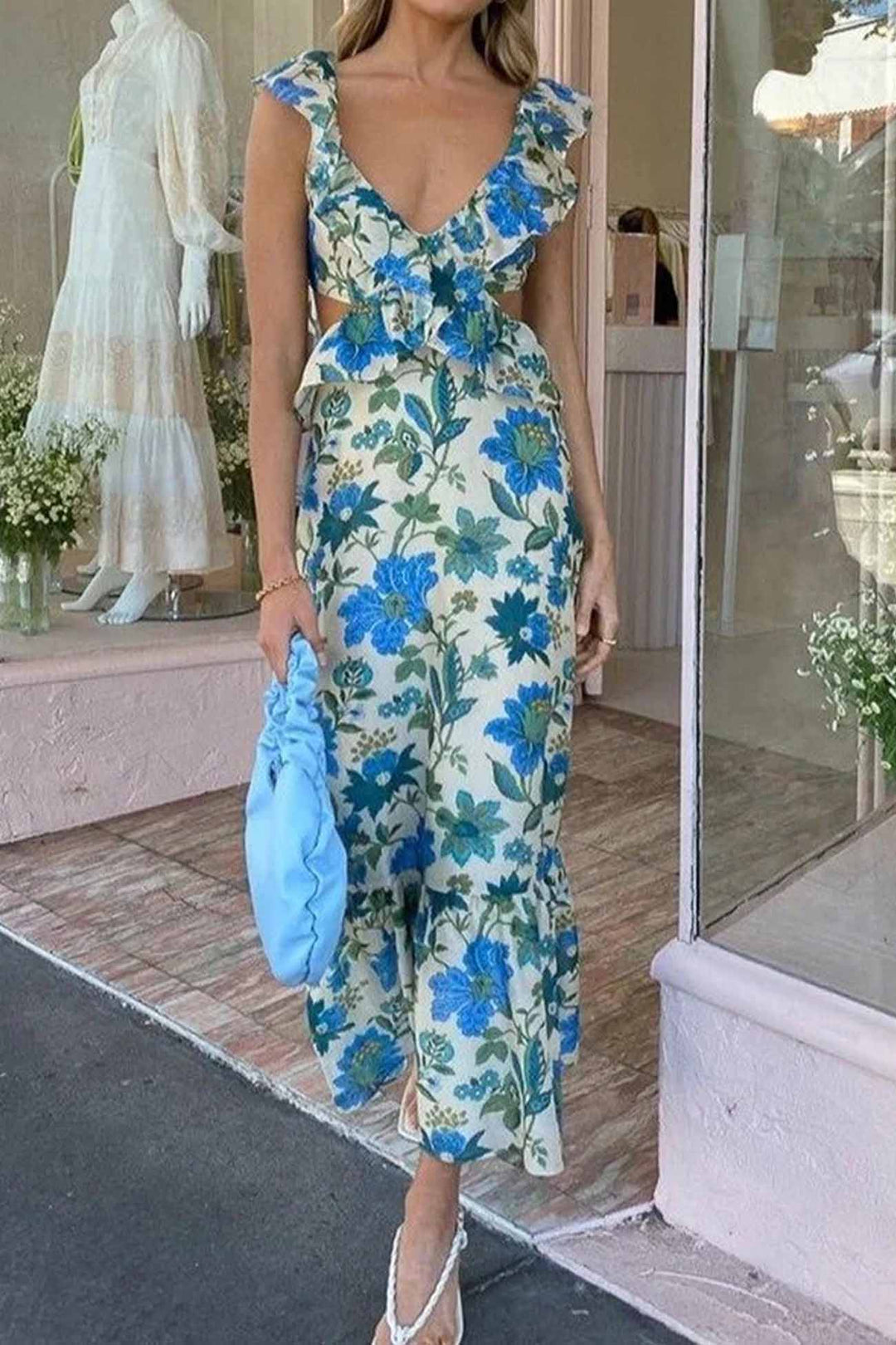 Damers vardagsklänning: Orangeblå blommig maxiklänning med volangfåll, både elegant och bekväm.