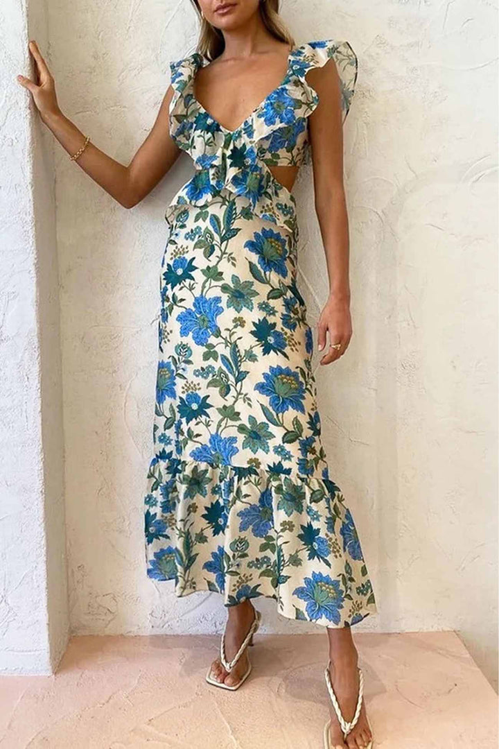 Festklänning: Maxi-längd orange klänning med intrikat blommönster och flödande volanger för damer.