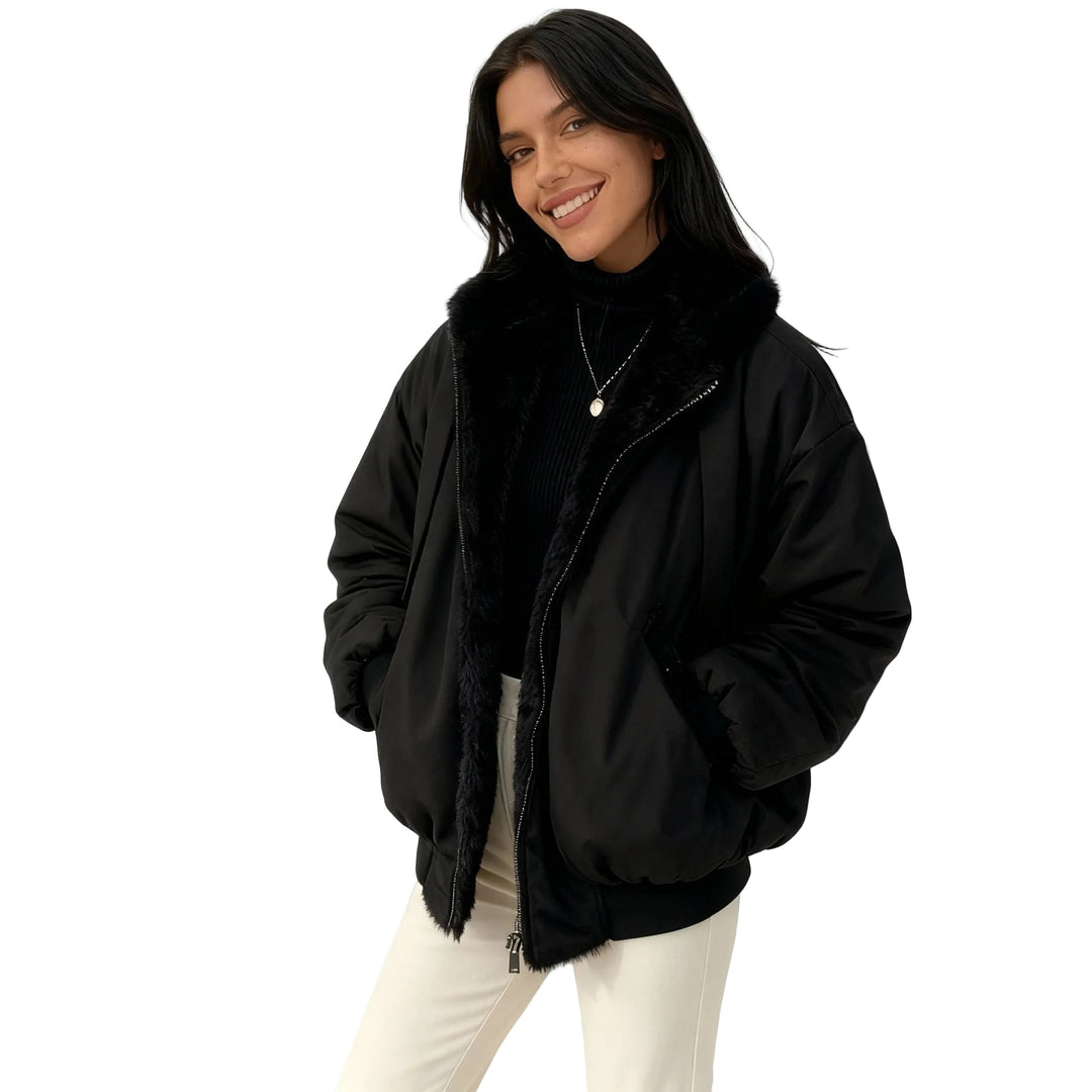 Kvinnors oversized vinterjacka i brunt med huva, perfekt för kalla dagar.