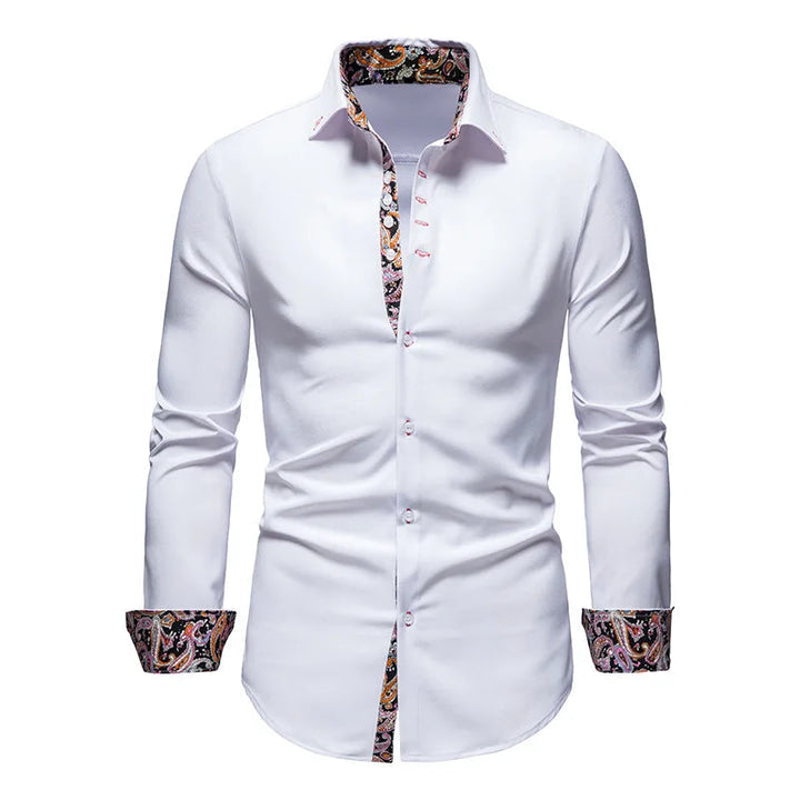 Bekväm och maskintvättbar kvinnors skjorta med livfullt paisley-tryck för vår- och höstmode.