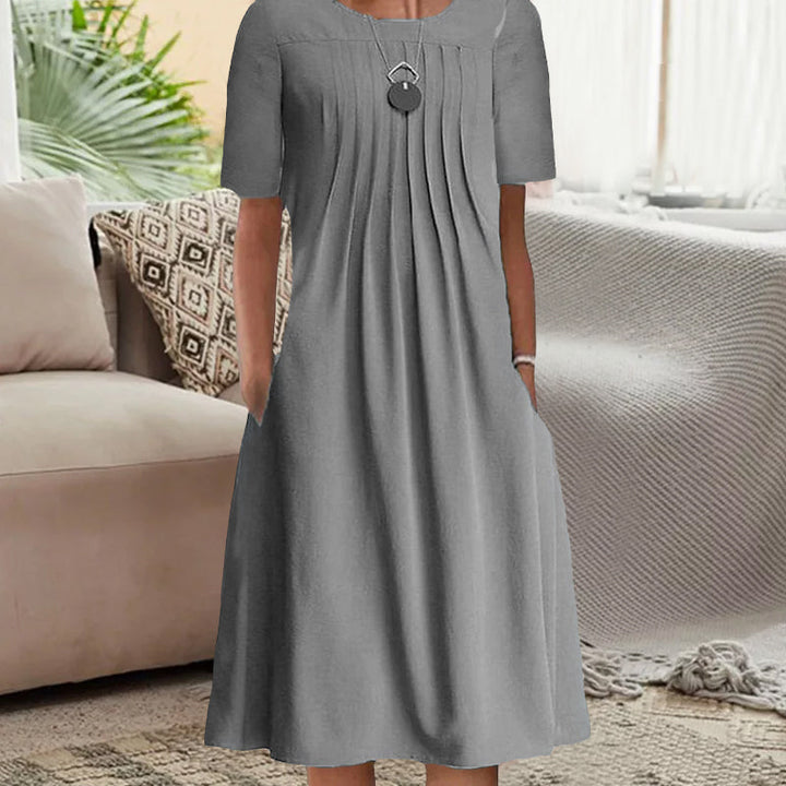 "Kvinnors plisserad långärmad klänning med rund hals, enfärgad tylltyg ger elegant och sofistikerad look."