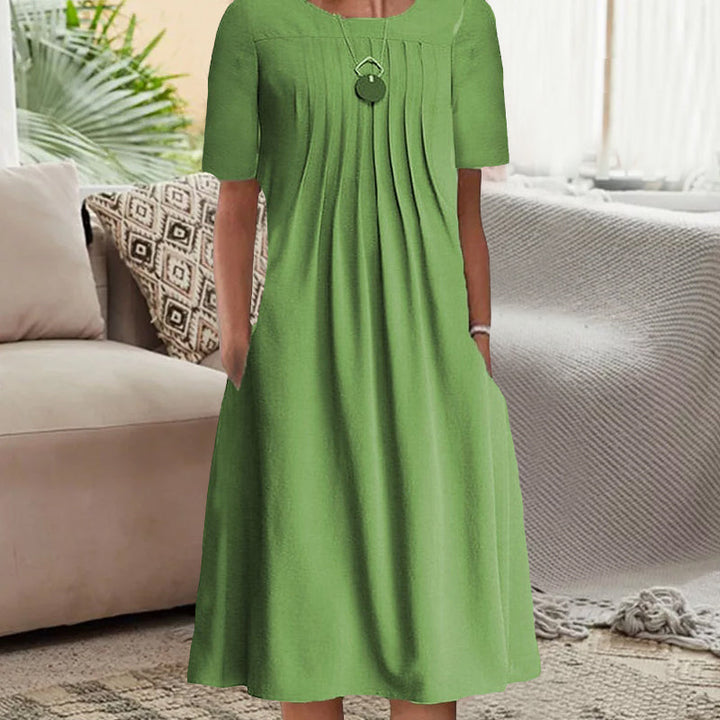 "Kvinnors plisserad långärmad klänning med rund hals, enfärgad tylltyg ger elegant och sofistikerad look."