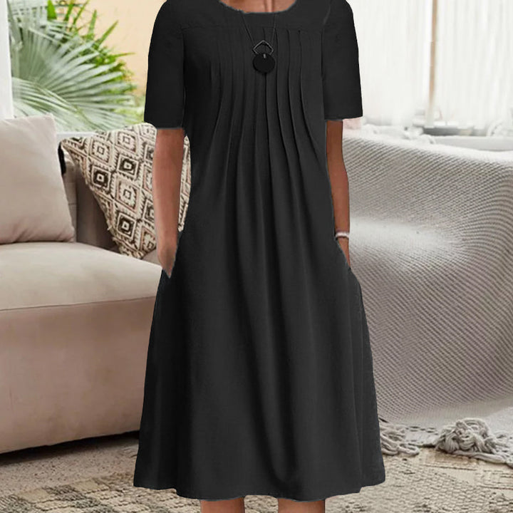 "Kvinnors plisserad långärmad klänning med rund hals, enfärgad tylltyg ger elegant och sofistikerad look."