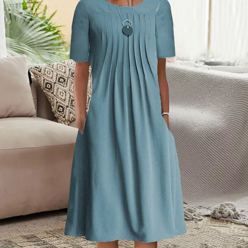"Kvinnors plisserad långärmad klänning med rund hals, enfärgad tylltyg ger elegant och sofistikerad look."