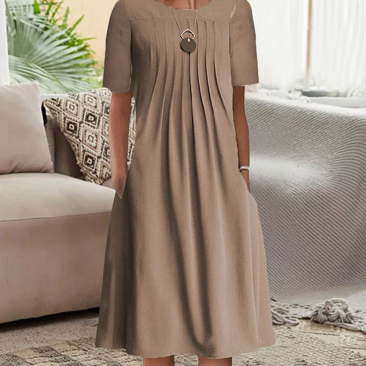 "Kvinnors plisserad långärmad klänning med rund hals, enfärgad tylltyg ger elegant och sofistikerad look."
