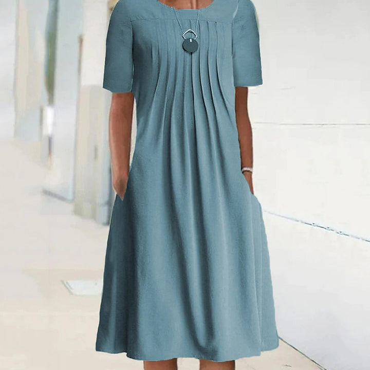 "Kvinnors plisserad långärmad klänning med rund hals, enfärgad tylltyg ger elegant och sofistikerad look."