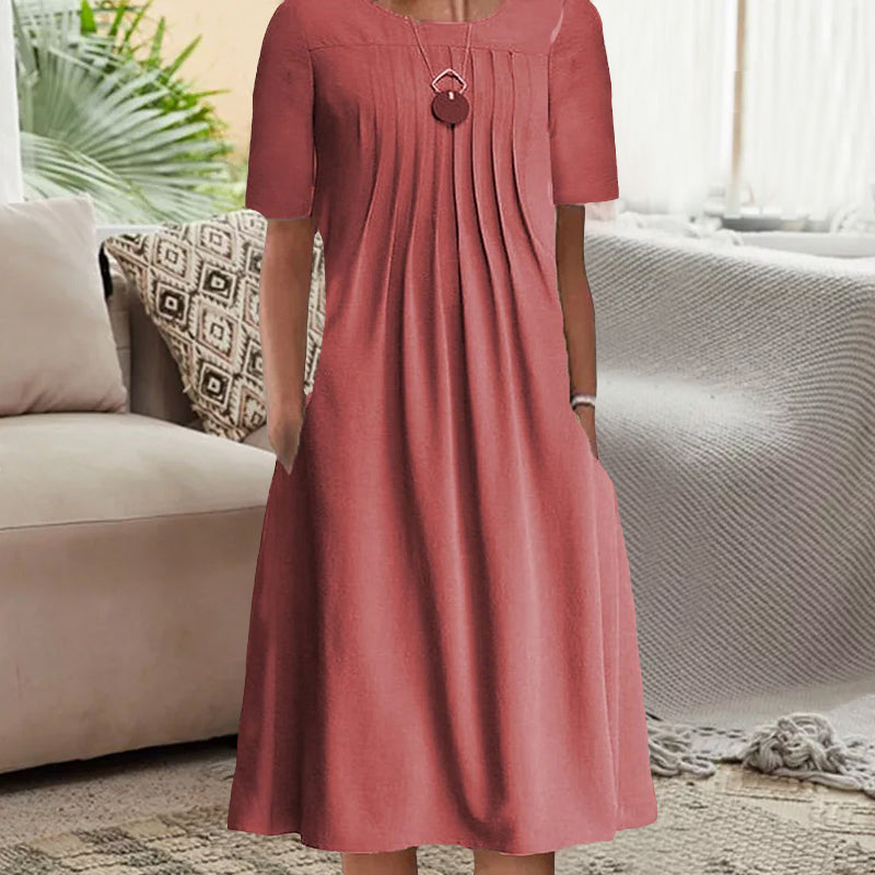 "Kvinnors plisserad långärmad klänning med rund hals, enfärgad tylltyg ger elegant och sofistikerad look."