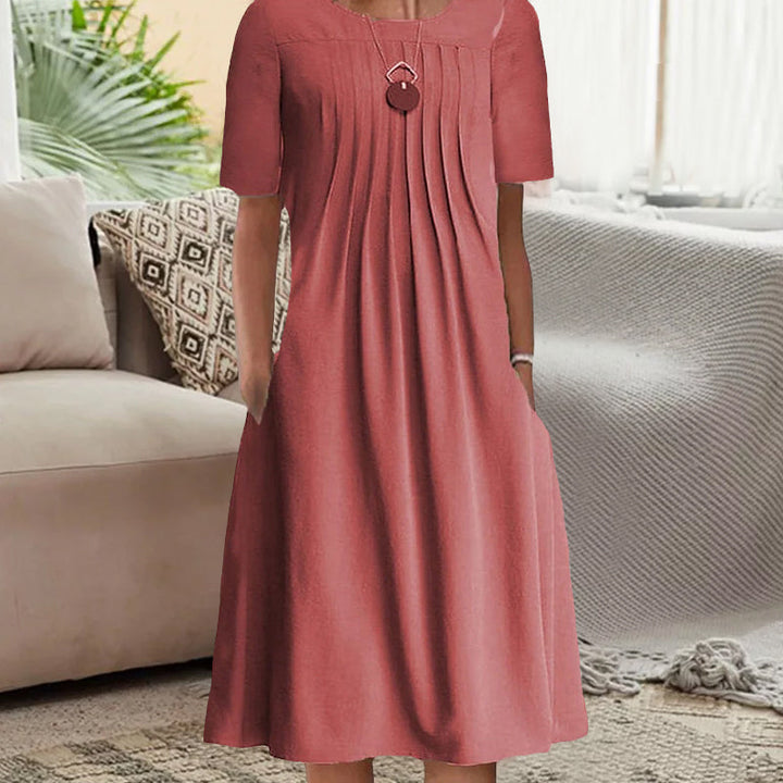 "Kvinnors plisserad långärmad klänning med rund hals, enfärgad tylltyg ger elegant och sofistikerad look."