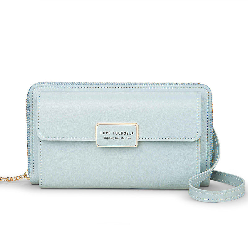 "Kvinnors quiltad crossbody-telefonväska i PU-läder, röd, med justerbara remmar och elegant mönster, perfekt för dagligt bruk