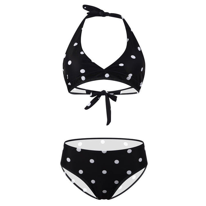 "Kvinnors sommarblommig bikiniset framifrån, livlig blommig design i blå och vit för strand och pooldagar."
