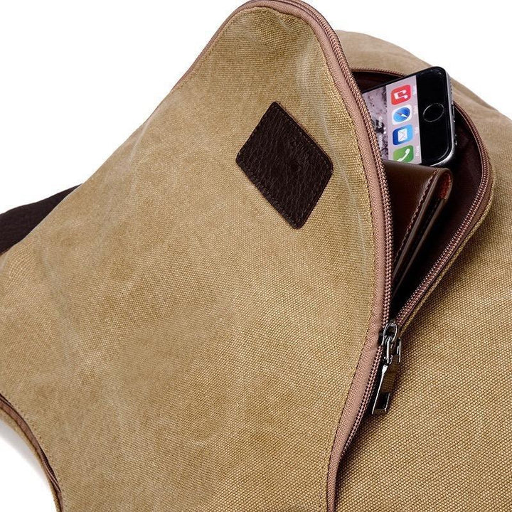 "Kvinnors stor canvas handväska i robust canvas med säker dragkedja, mjuk chic känsla, perfekt för dagligt bruk."