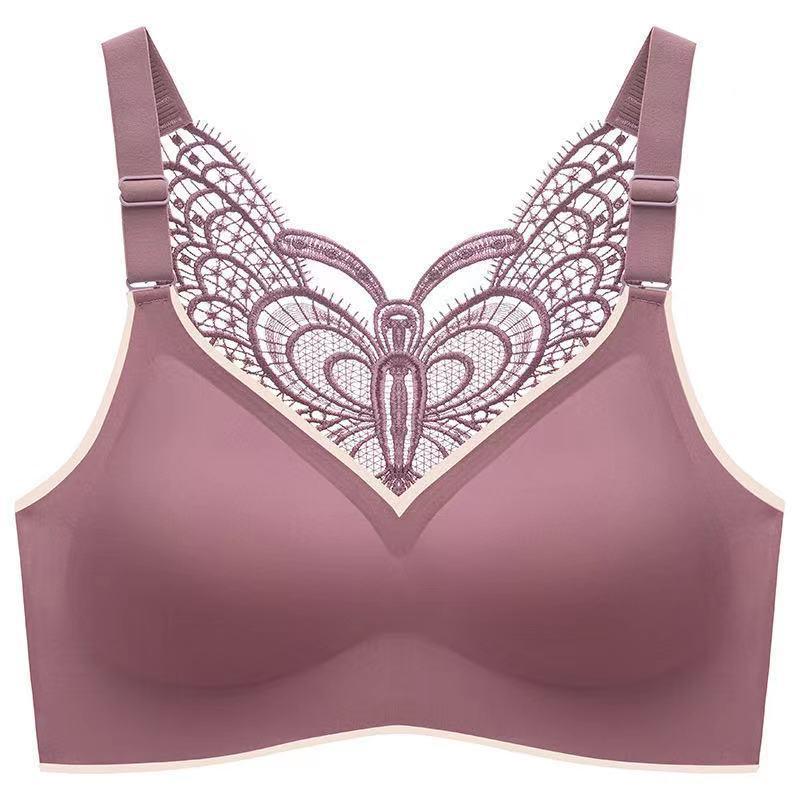 "Kvinnors trådfri butterfly bh, mjukt material, i svart och lila, ger komfort och stil för daglig användning."