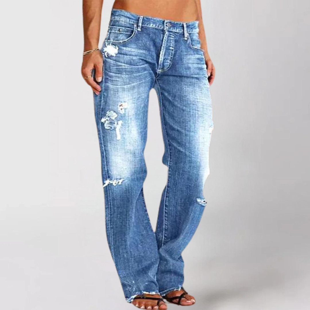 Moderiktiga kvinnors lågmidjade utsvängda jeans, bekväma vardagsjeans med denimkänsla.