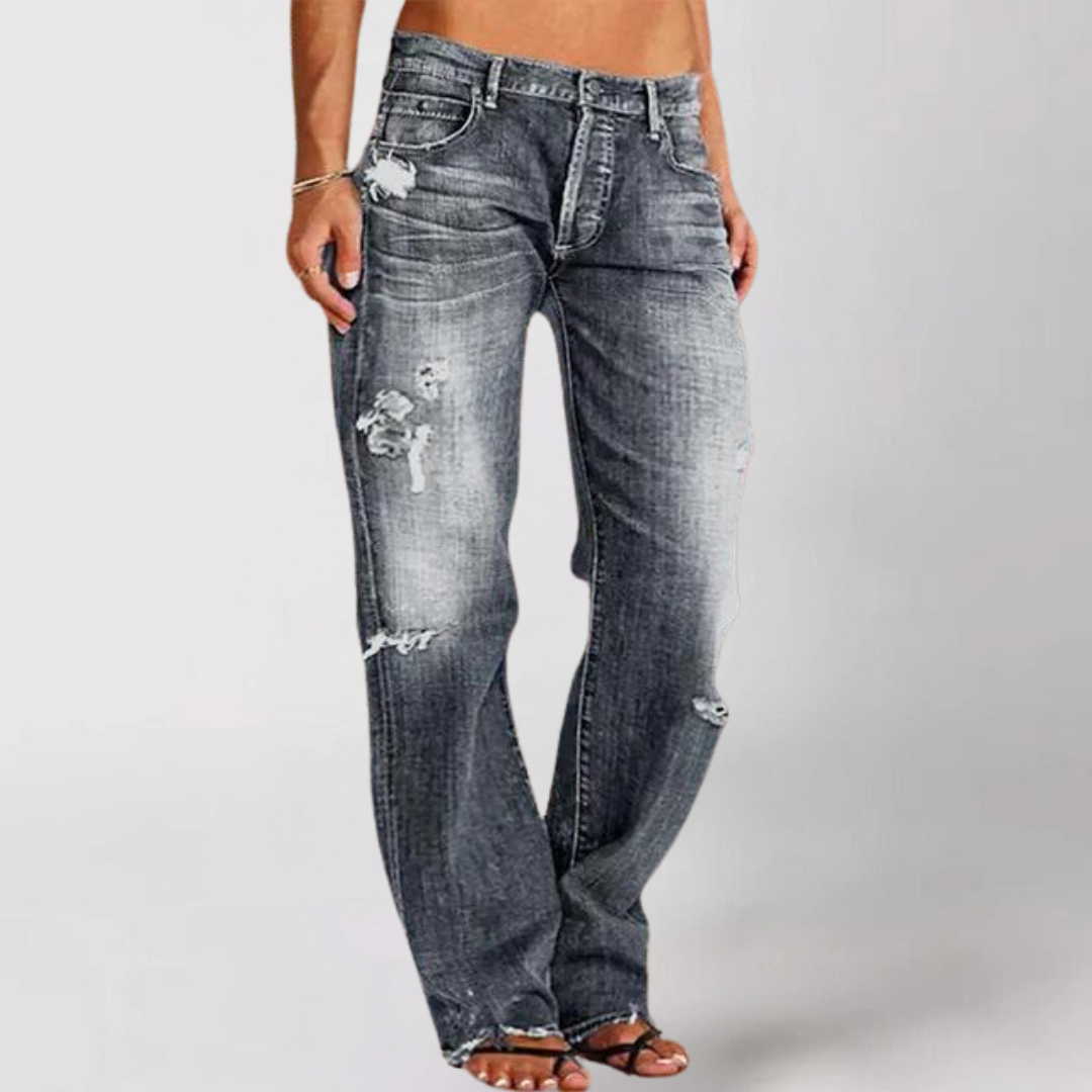 Kvinnors stretchjeans, utsvängda och lågmidjade, perfekta för bekväm och moderiktig vardagsanvändning.