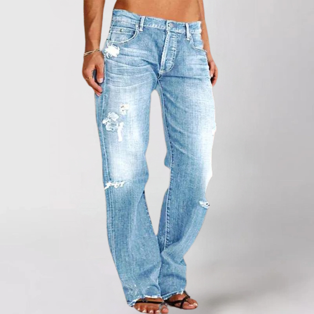 Helfigur av kvinnors denimjeans, utsvängda ben med låg midja, för en stilren och flexibel look.