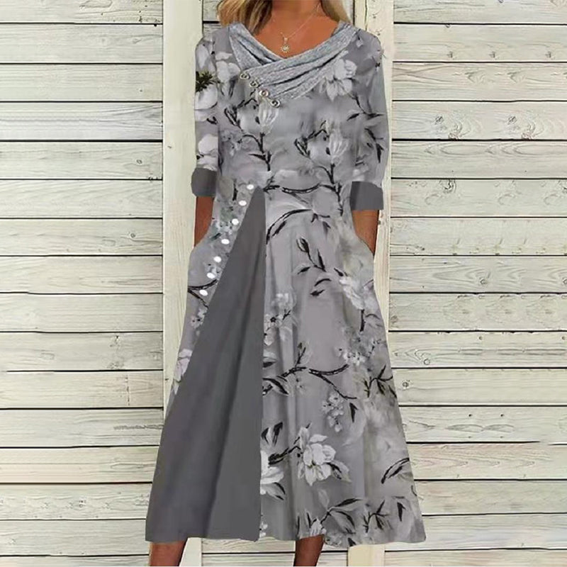 "Kvinnors V-ringad blommig A-line midi klänning i mjukt polyester med V-hals och blommönster, perfekt för sommaren."