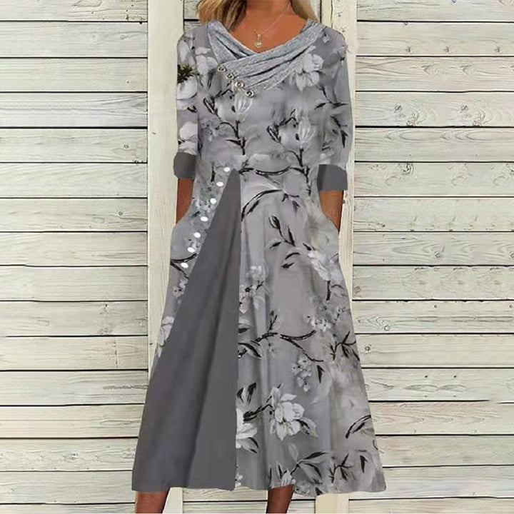 "Kvinnors V-ringad blommig A-line midi klänning i mjukt polyester med V-hals och blommönster, perfekt för sommaren."