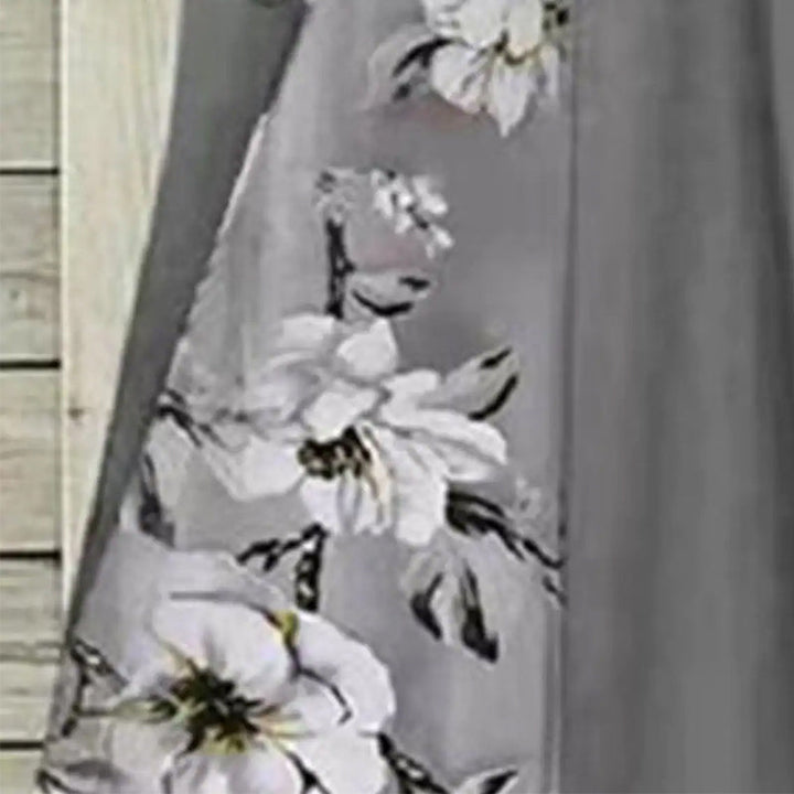 "Kvinnors V-ringad blommig A-line midi klänning i mjukt polyester med V-hals och blommönster, perfekt för sommaren."