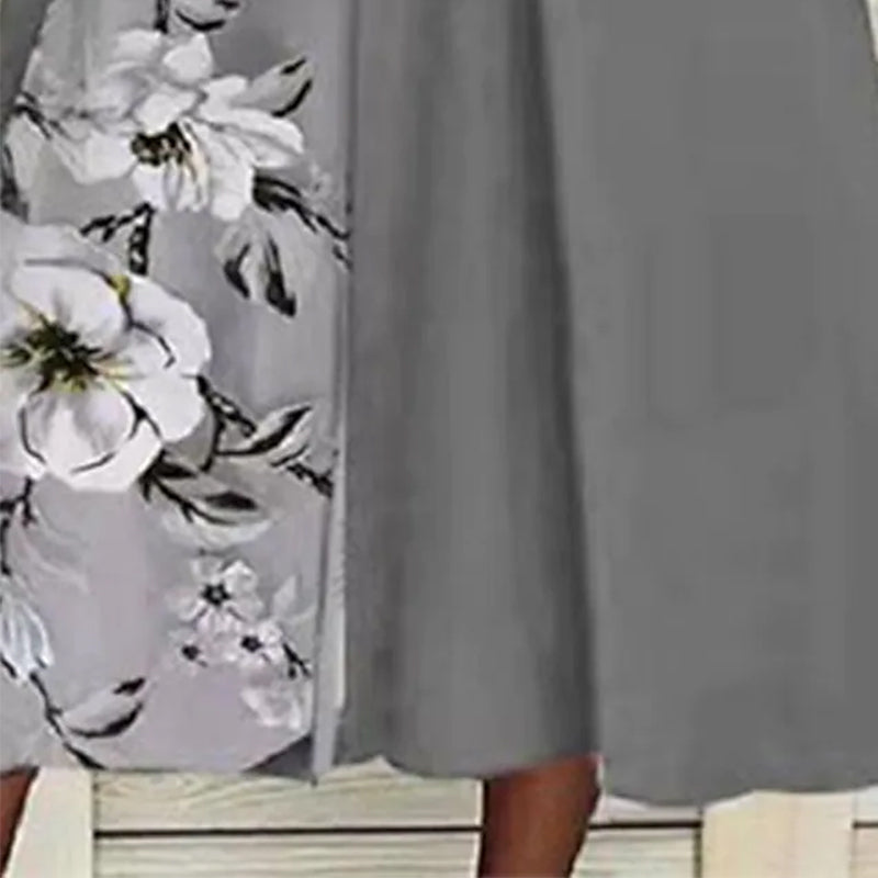 "Kvinnors V-ringad blommig A-line midi klänning i mjukt polyester med V-hals och blommönster, perfekt för sommaren."