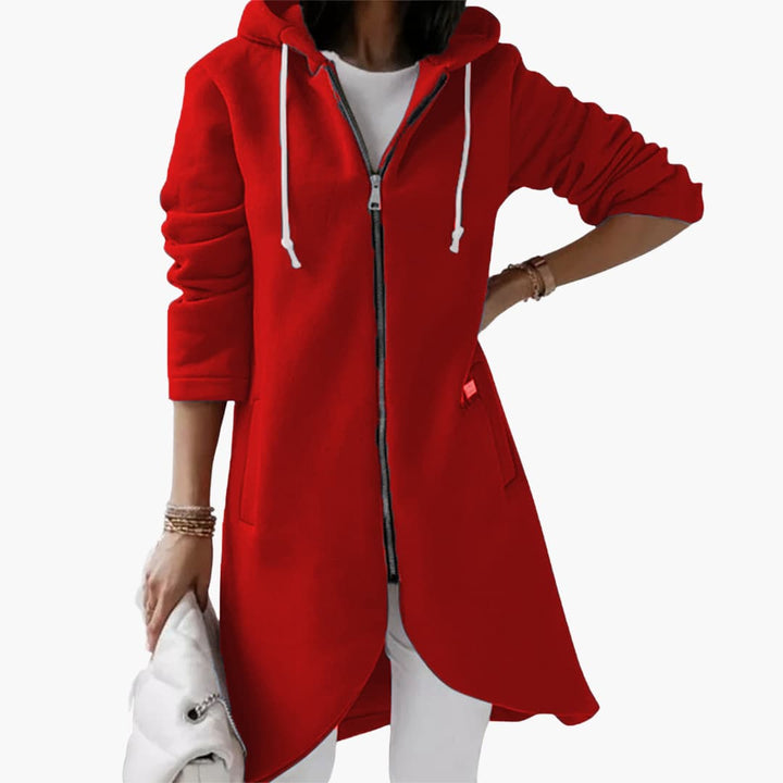 Lång, bekväm damhoodie med dragkedja i stilren design för vardagsbruk. Perfekt vardagsstil.