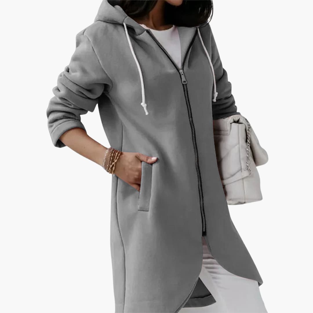 Långärmad damhoodie med dragkedja i mjukt tyg, en bekväm luvtröja för alla tillfällen.